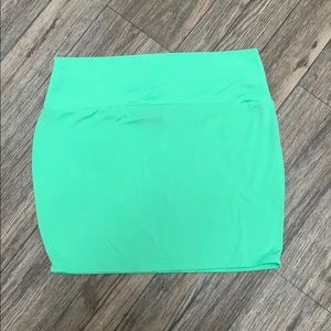 Light green mini skirt.